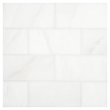 3" x 6" subway tile in polished White Whisp Dolomiti marble.