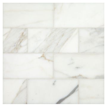 3" x 6" subway tile in honed calacatta gold marble.