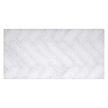 1" x 4" herringbone mosaic tile in polished Crystal Grain marble.