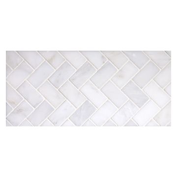 1" x 2" herringbone mosaic tile in polished White Blossom marble.
