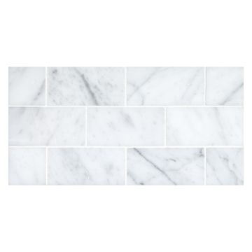 2" x 4" Brick mosaic tile in honed Carrara Claro marble.