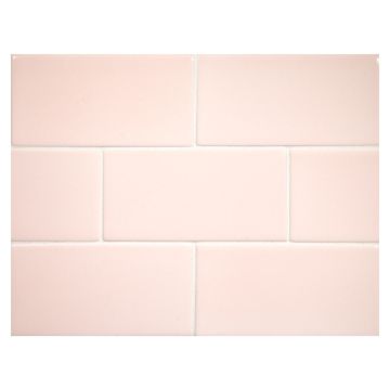 Vermeere 3" x 6" ceramic subway tile in Pretty Pink with a gloss finish.