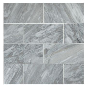 3" x 6" subway tile in honed Bardiglio Turno marble.