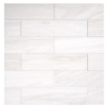 2" x 8" subway tile in honed Ice Cap Mist marble.