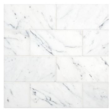 3" x 6" subway tile in polished Statuary marble.