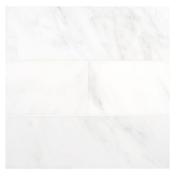 4" x 12" field tile in honed Arcello marble.