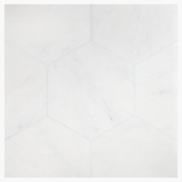 12" Hexagon field tile in honed White Blossom marble.