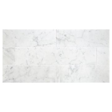 4" x 18" field tile in Carrara Claro Light honed marble.