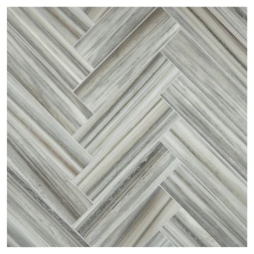 1-1/2" x 6" Herringbone mosaic in honed Striatini Gris marble.
