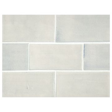 Tiepolo ceramic 2" x 4" field tile in Cloud color with a gloss finish.