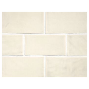 Tiepolo ceramics 2" x 4" field tile in Dove color with a gloss finish.