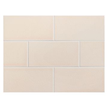 Vermeere 3" x 6" ceramic subway tile in Bermuda Sand with a crackle finish.