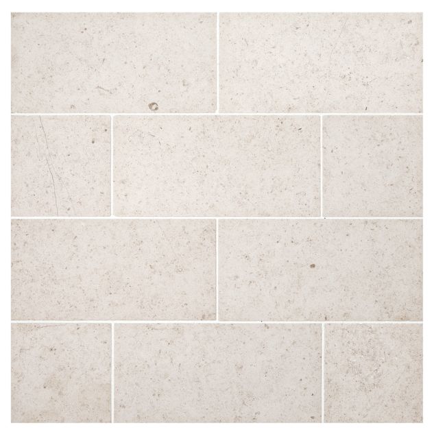 3" x 6" Subway Tile in honed Lebeno Fine Grain limestone.
