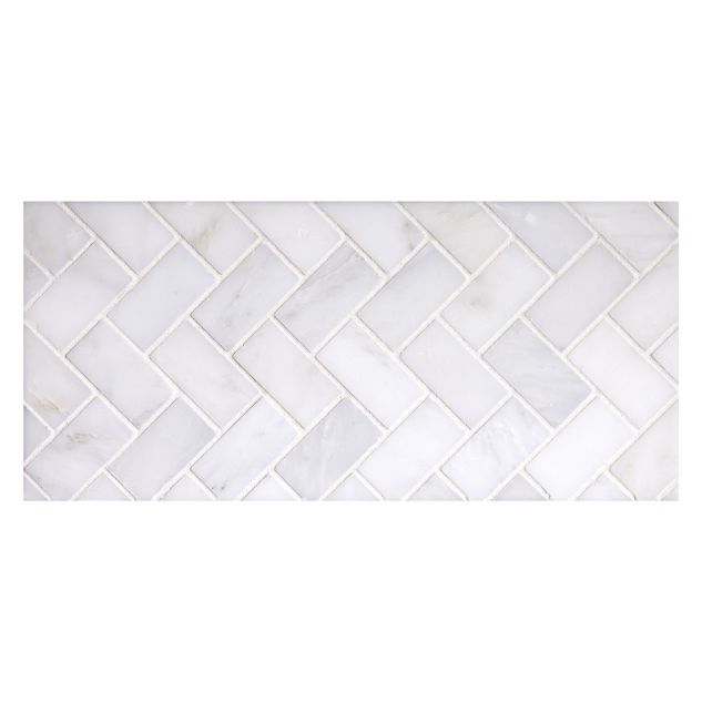 1" x 2" herringbone mosaic tile in polished White Blossom marble.