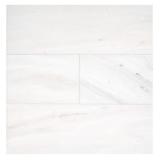 4" x 12" field tile in honed Ice Cap Mist marble.
