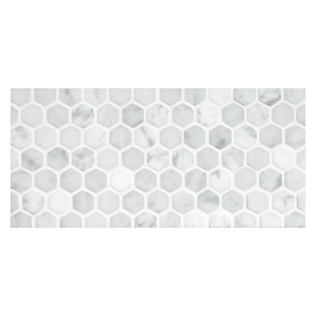 1" hexagon mosaic in tumbled Carrara marble.