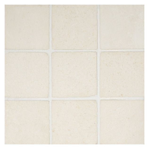 2" square mosaic in honed Corsica CrÃ¨me marble.