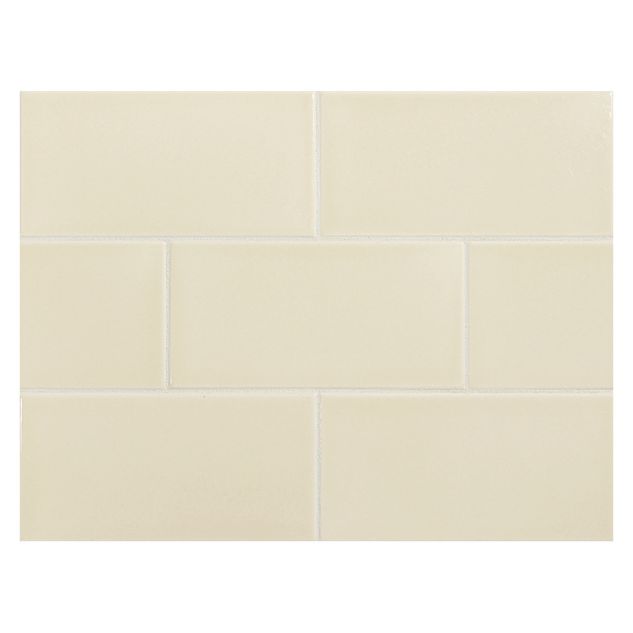 Vermeere 3"x 6" ceramic subway tile in Dark Cream with a gloss finish.