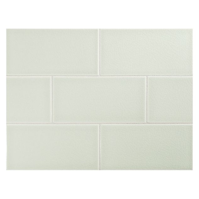 Vermeere 3" x 6" ceramic subway tile in Serene Green with a crackle finish.