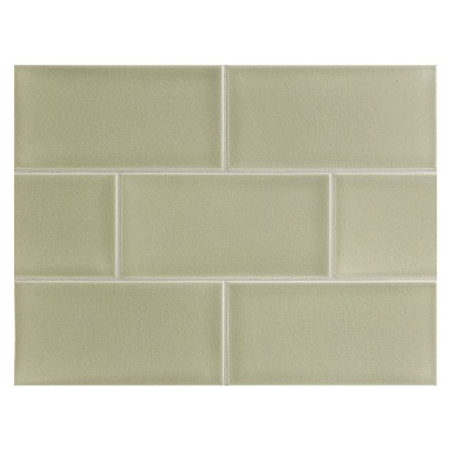 Vermeere 3" x 6" ceramic subway tile in Botanical Green with a crackle finish.