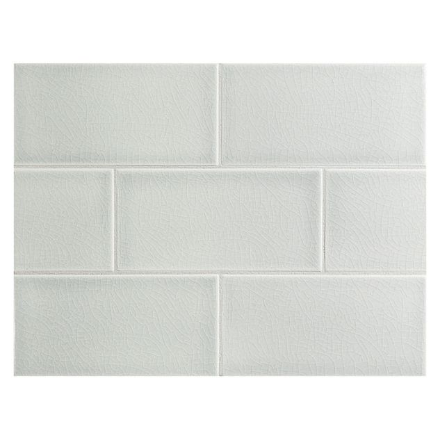 Vermeere 3" x 6" ceramic subway tile in Light Aspen with a crackle finish.