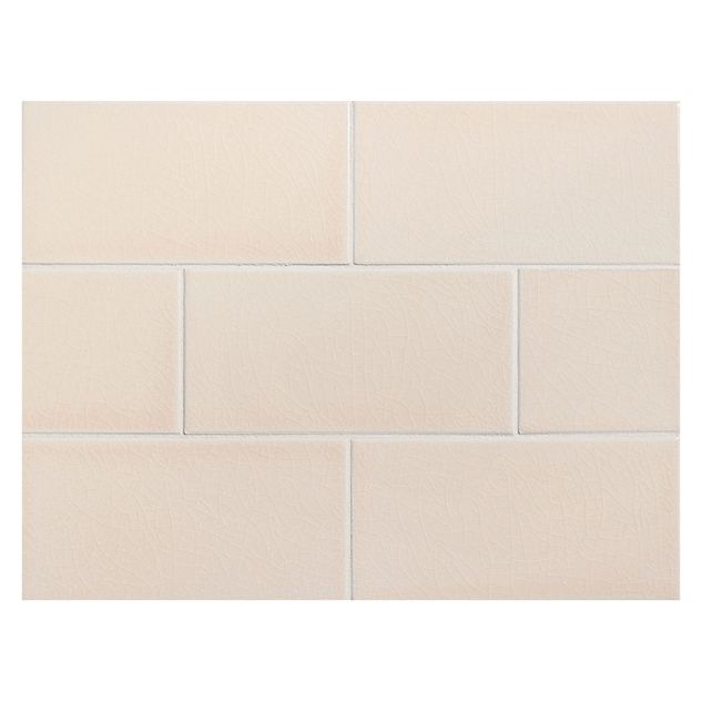 Vermeere 3" x 6" ceramic subway tile in Bermuda Sand with a crackle finish.