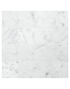 This marble clad bathroom design utilizes 3