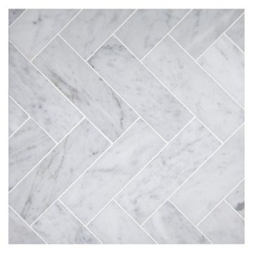 2" x 6" herringbone mosaic in honed Carrara marble.