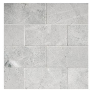 3' x 6" subway tile in polished Gris De Bleu marble.