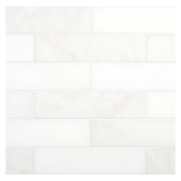 2" x 8" subway tile in honed Arcello marble.
