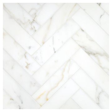 Herringbone Harmony 1-1/2" x 6" marble mosaic made from honed Calacatta Gold.