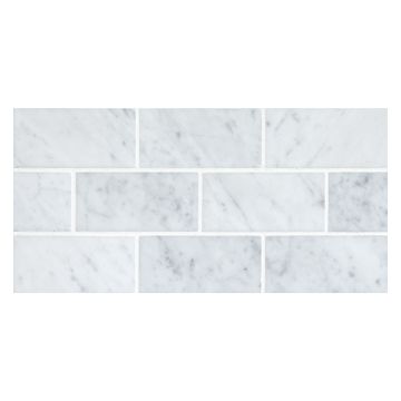 2" x 4" Brick mosaic in polished Carrara marble.
