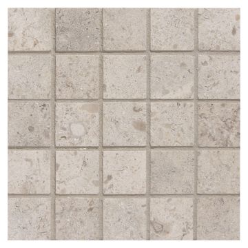 1" square mosaic tile in honed Lisbon Bleu limestone.