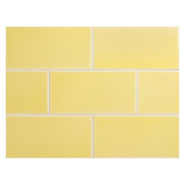 Vermeere 3" x 6" ceramic subway tile in Yellow with a crackle finish.