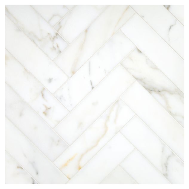 Herringbone Harmony 1-1/2" x 6" marble mosaic made from honed Calacatta Gold.