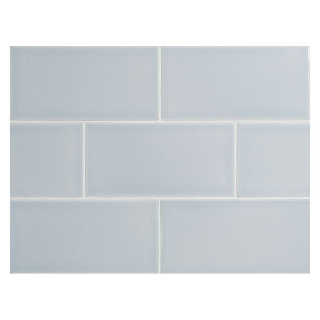 Vermeere 3" x 6" ceramic subway tile in Ice Blue with a gloss finish.