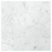 3" x 6" subway tile in honed Carrara marble.