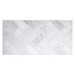 1" x 4" herringbone mosaic tile in polished White Blossom marble.