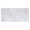 1"x  4" herringbone mosaic in polished carrara marble.