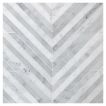 Chevron mosaic pattern in polished Carrara marble. 