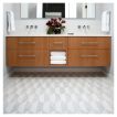 Master bathroom floor installation of Chrysler Spire Solid tile pattern in White Whisp Dolomiti and Carrara marble.