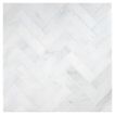 1" x 4" Herringbone mosaic tile in honed White Blossom marble.