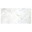 A larger field of Herringbone Harmony 1-1/2" x 6" marble mosaic made from honed Calacatta Gold.