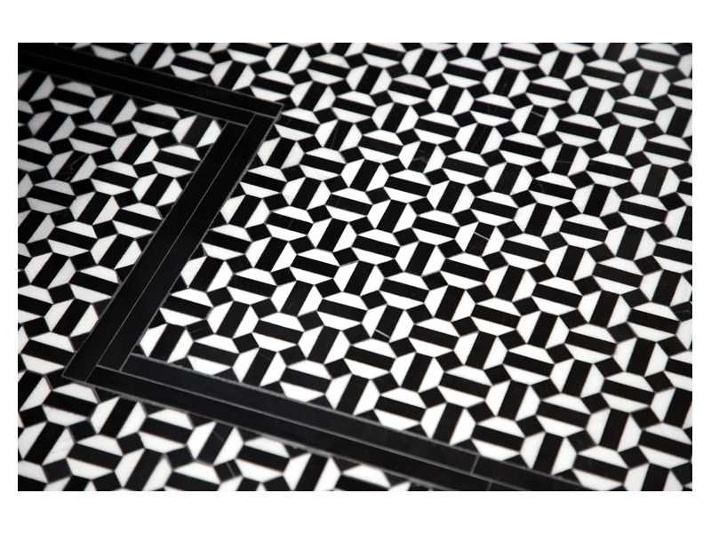A detailed view of the Rio stone mosaic, made from polished Thassos and Nero Marquina marble. 