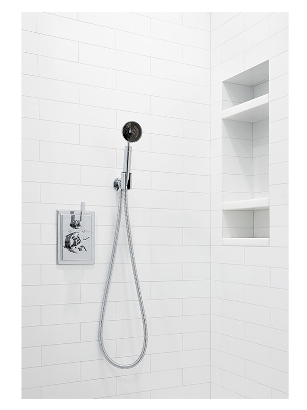 A close up of the Ultra Flat Subway Tile shower wall in this primary bathroom design.