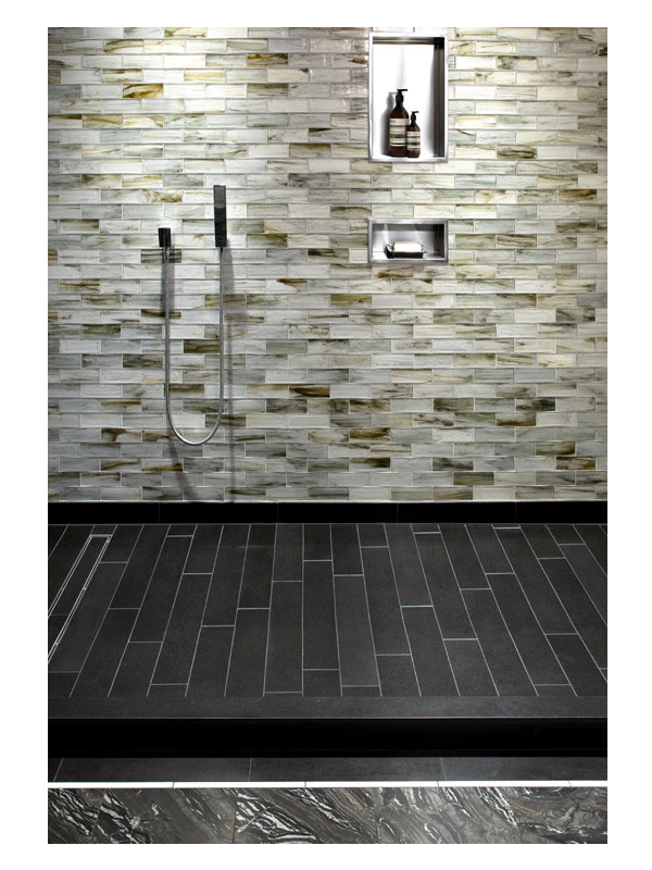 The shower area of this commerical bathroom shows the beautiful range of the Zumi Structured Glass 2