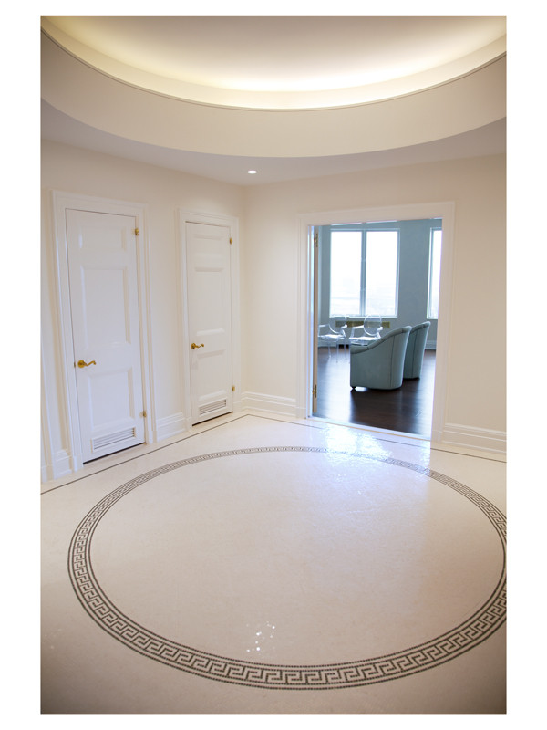 A grand foyer with a custom mosaic floor - 3/8