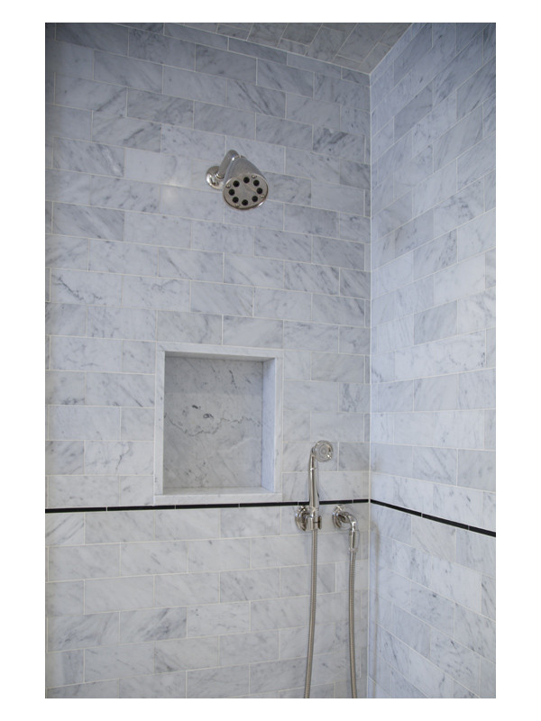 A beautiful marble clad shower, showcasing 3