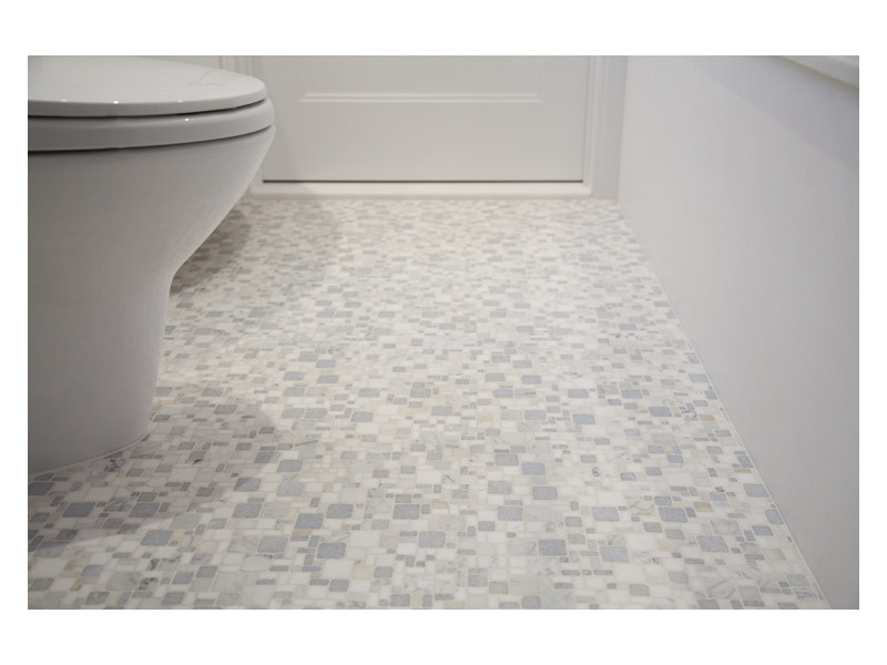 A close up of the Opus mosaic floor from the Complete Tile Collection, in Azul Antique tumbled marble. 