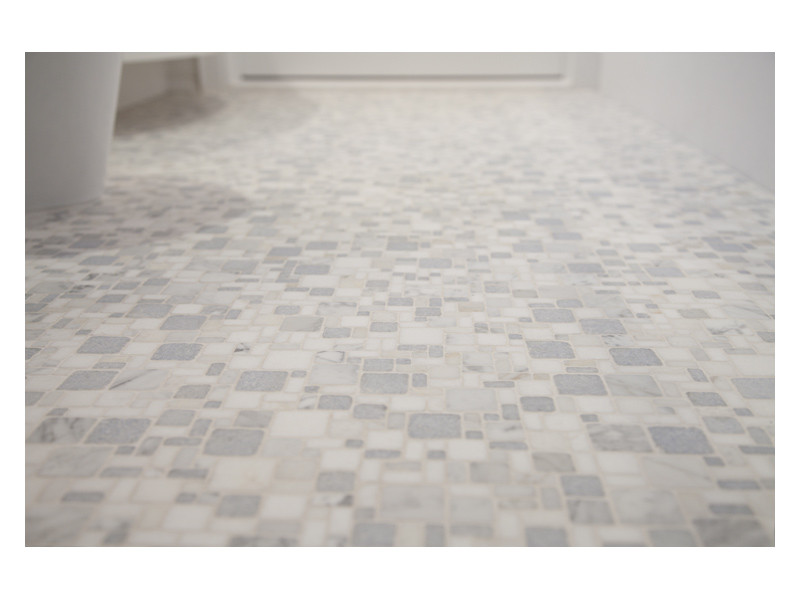 A close up of the Opus mosaic floor from the Complete Tile Collection, in Azul Antique tumbled marble. 